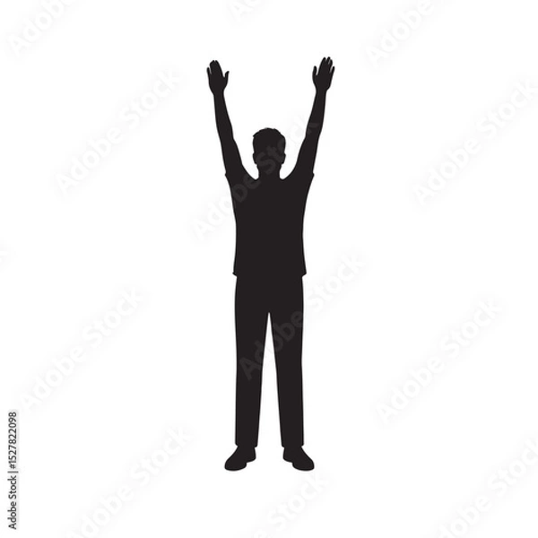 Fototapeta Silhouette of man standing with both hands raised up