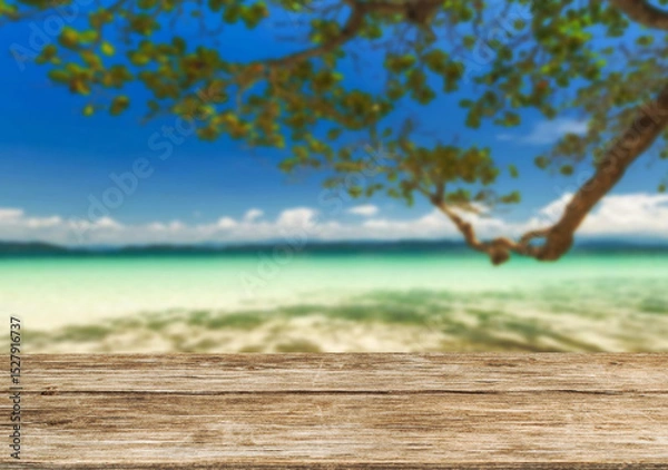 Obraz Wooden table top on the beach or sea.Party on the beach  sunshine time concept.For montage product display or design key visual layout.View of copy space.