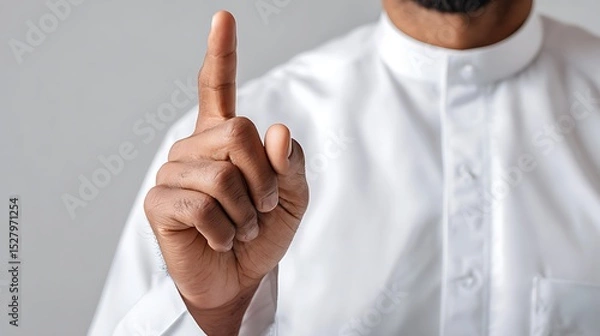 Obraz Close Up of a Muslim Finger Pointing Up : Suitable for Be Used in Blog Posts, Social Media Posts or Website Content Related to People, Culture and Religion Theme.