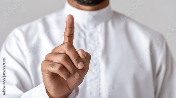 Obraz Close Up of a Muslim Finger Pointing Up : Suitable for Be Used in Blog Posts, Social Media Posts or Website Content Related to People, Culture and Religion Theme.