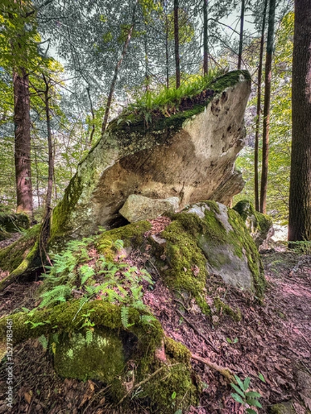 Fototapeta Large jutting rock on hiking trail