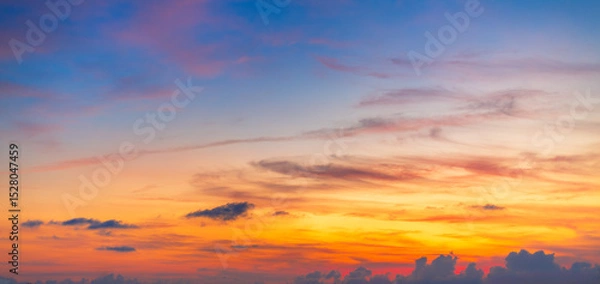 Fototapeta Colorful sky backdrop in the morning,Nature beautiful Light Sunset or sunrise sky,Sunset Sky Background in the Evening with Dramatic Dusk Clouds and Colorful Pink, Orange Sunlight on Blue Twilight sky