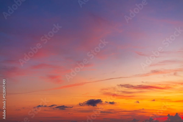 Fototapeta Colorful sky backdrop in the morning,Nature beautiful Light Sunset or sunrise sky,Sunset Sky Background in the Evening with Dramatic Dusk Clouds and Colorful Pink, Orange Sunlight on Blue Twilight sky