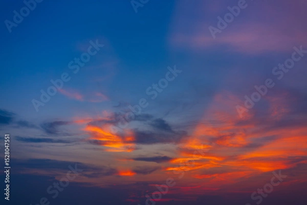 Fototapeta Colorful sky backdrop in the morning,Nature beautiful Light Sunset or sunrise sky,Sunset Sky Background in the Evening with Dramatic Dusk Clouds and Colorful Pink, Orange Sunlight on Blue Twilight sky