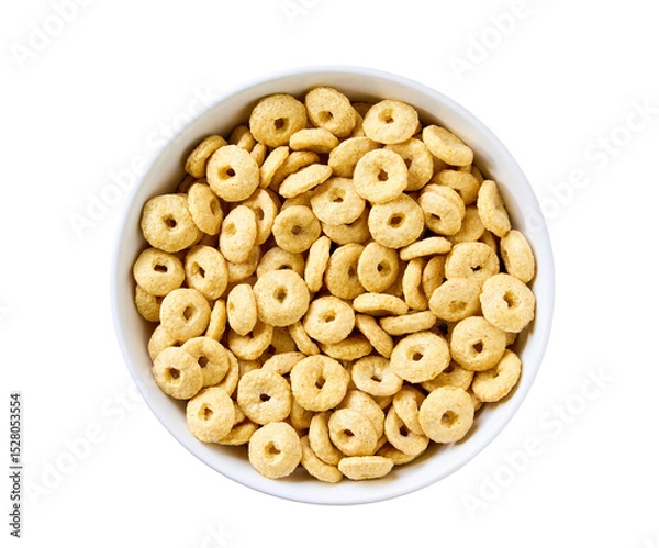 Fototapeta Whole grain cereal rings in a plate isolated on a white background, top view. healthy sweet snack for breakfast.