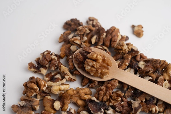 Fototapeta Walnuts close up. Healthy food. Walnuts in paper cups