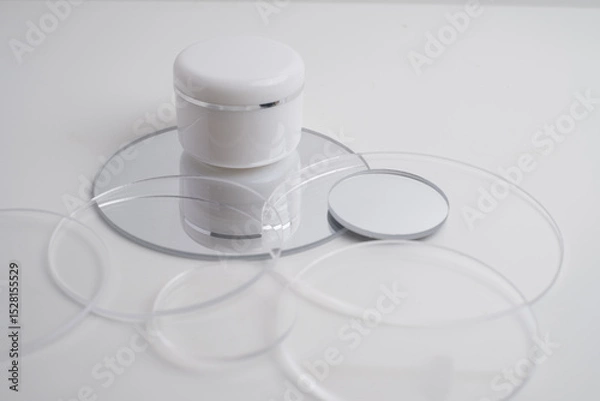 Fototapeta Container for cream, shampoo, toiletries, spa. Unbranded white plastic bottles. Bottle with a dispenser for cosmetic products. Skin care and beauty concept. Mockup style, copy space