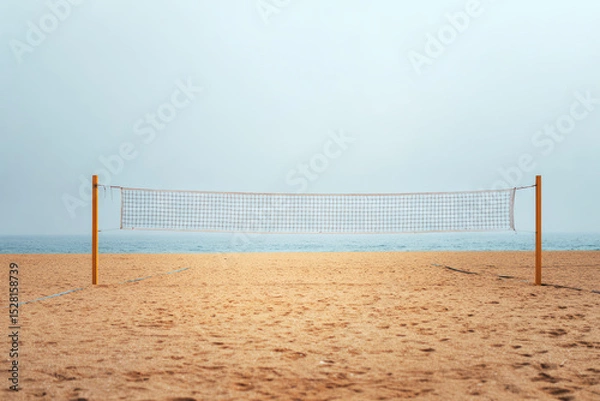 Obraz Empty beach volleyball net stretched across golden sand with calm ocean in background under soft daylight. ai generative

