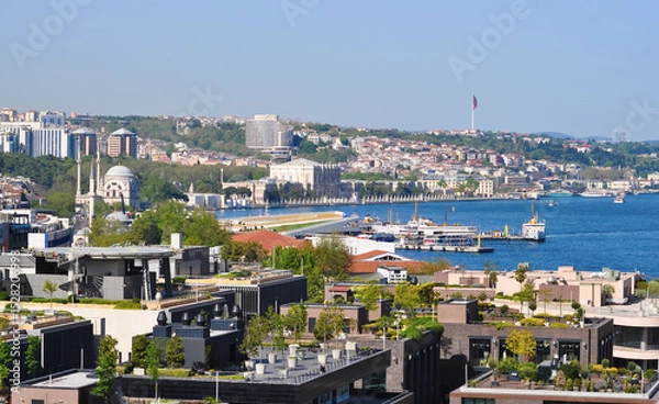 Fototapeta Istanbul, Turkey - Galataport waterfront in Karakoy with a view of the city skyline