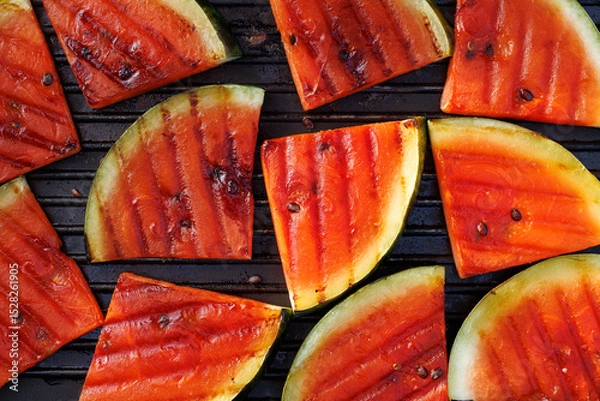 Obraz Grilled watermelon slices on a grill plate, close up view, top view