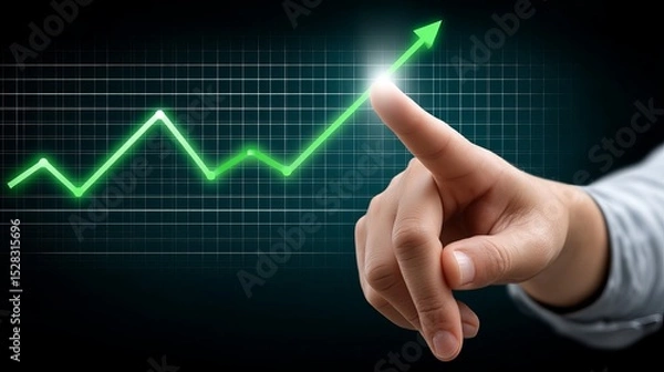 Fototapeta A close-up of a male hand pointing at an upward trend on a digital graph.