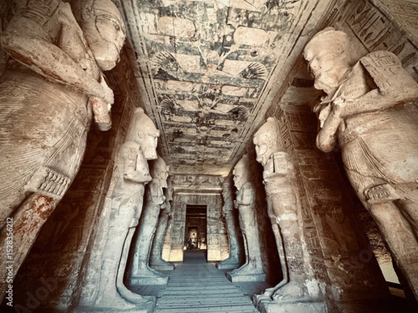 Fototapeta Interior view with giant statues of Ramses II Abu Simbel temple, ancient Egypt