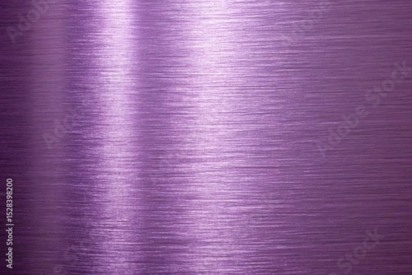 Fototapeta Close-up of a purple metallic textured surface with smooth light reflections and a brushed finish.