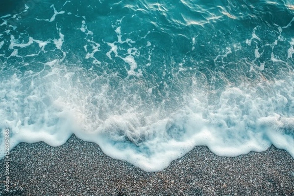 Obraz Peaceful waves gently lap at the shore creating a serene coastal landscape during daylight, Tranquility and serenity nature background Wave on sea coast beach