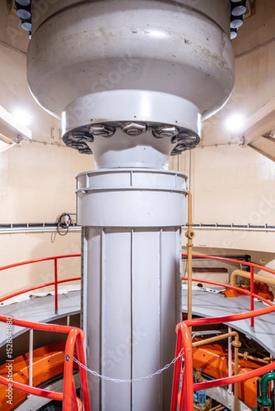 Fototapeta A Kaplan turbine located in the Orlik Hydroelectric Power Station in Czechia shows its intricate design. The powerful equipment is pivotal for harnessing water energy efficiently.