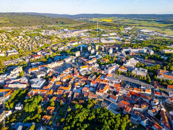 Fototapeta An aerial overview of Pribram illustrates the blend of urban development and surrounding greenery.