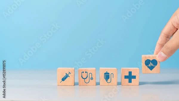 Obraz Hand picking wooden block with healthcare symbol. Concept of medical service quality, health insurance, and patient satisfaction. Minimal composition on clean background
