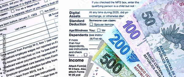 Fototapeta Argentine pesos money bills in big amount lies on table with pen and tax forms close up