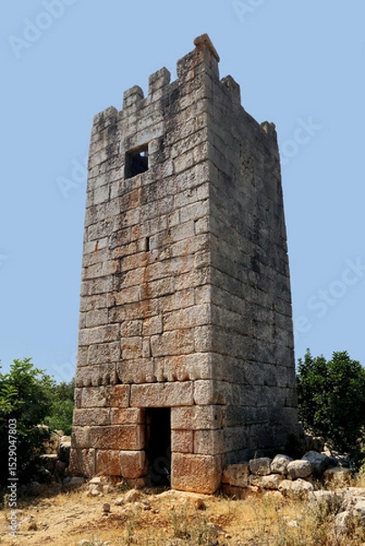 Fototapeta South-eastern view of the Roman watch tower called Gücük Kale in Turkish, located on the side of road from Kizkalesi to Huseyinler in Erdemli district of Mersin Province in southern Turkey.