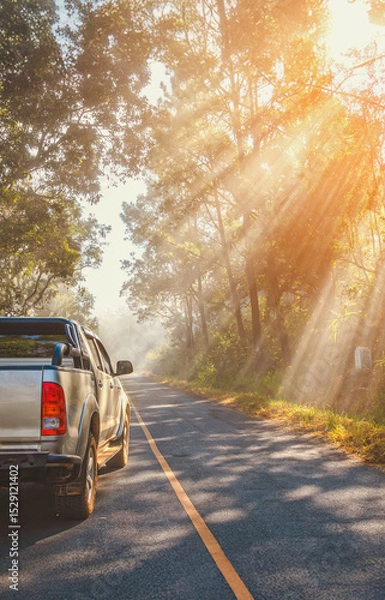 Fototapeta Off-road car travel on mountain roads in woodland forest landscape.