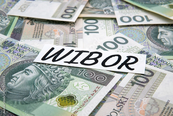 Fototapeta Inscription WIBOR next to polish money. WIBOR is Warsaw Interbank Offered Rate