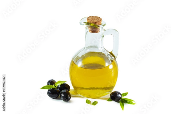 Fototapeta Extra virgin olive oil in a transparent jug and black olives with leaves.