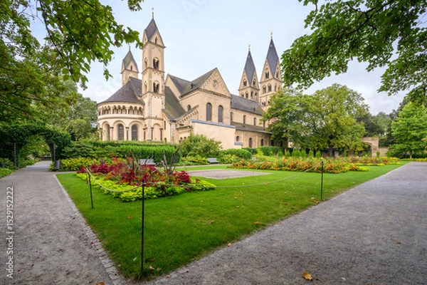 Fototapeta View of Basilika Sankt Kastor in Koblenz Germany surrounded by gardens