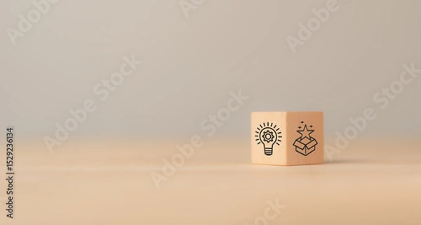 Obraz Creative idea generation for new product development concept. Creative thinking and innovation. Wooden block with product development icons, generating creative ideas,  market entry, commercialization