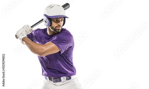 Fototapeta A baseball player in a purple jersey and helmet stands ready to swing a bat, showcasing athleticism and focus in this dynamic pose