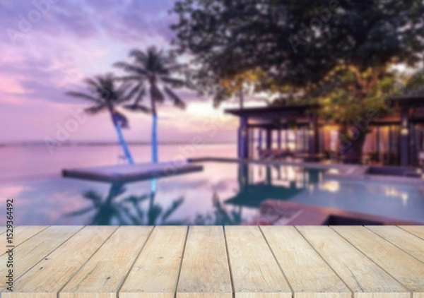 Obraz Wooden table top on the beach or sea. swimming pool Party on the beach  sunshine time concept.For montage product display or design key visual layout.View of copy space.