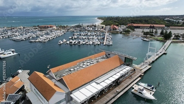 Fototapeta Hillarys, Australia – June 3, 2025: Aerial View of The Hillarys Boat Harbour of Perth CBD