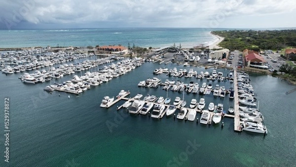 Fototapeta Hillarys, Australia – June 3, 2025: Aerial View of The Hillarys Boat Harbour of Perth CBD