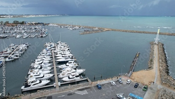 Fototapeta Hillarys, Australia – June 3, 2025: Aerial View of The Hillarys Boat Harbour of Perth CBD