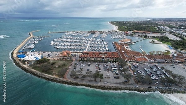 Fototapeta Hillarys, Australia – June 3, 2025: Aerial View of The Hillarys Boat Harbour of Perth CBD