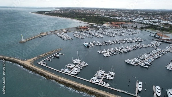 Fototapeta Hillarys, Australia – June 3, 2025: Aerial View of The Hillarys Boat Harbour of Perth CBD