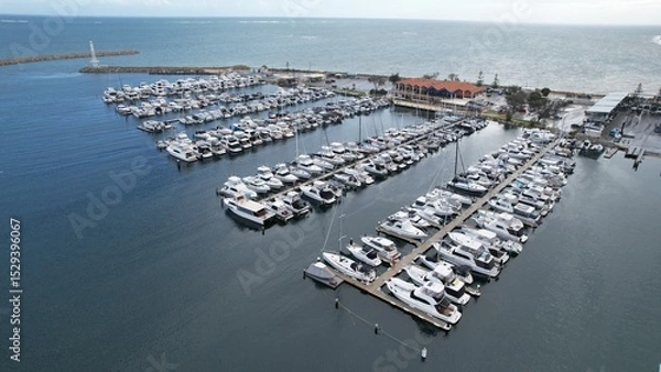 Fototapeta Hillarys, Australia – June 3, 2025: Aerial View of The Hillarys Boat Harbour of Perth CBD