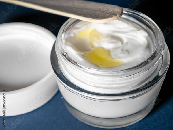 Obraz Mixing face cream, homemade ointment with oils close up