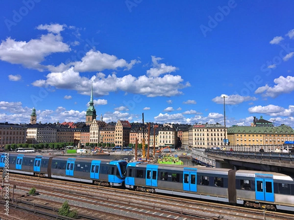 Fototapeta Railway tracks and trains near Stockholms main train station in Norrmalm area, Stockholm, Sweden