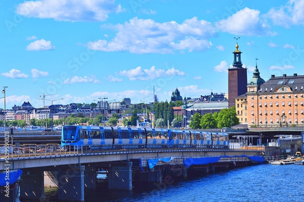 Fototapeta Railway tracks and trains near Stockholms main train station in Norrmalm area, Stockholm, Sweden