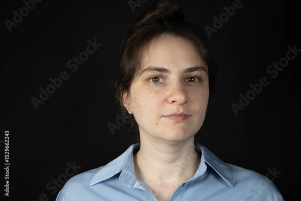 Fototapeta Portrait of 30 Year Old Woman Without Makeup with Real Skin with Moles and Pimples.