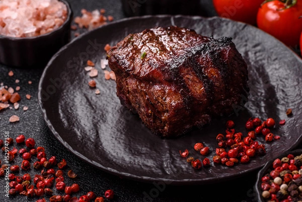 Obraz Grilled beef steak meat with salt and pepper. Beef steak grilled on a barbecue