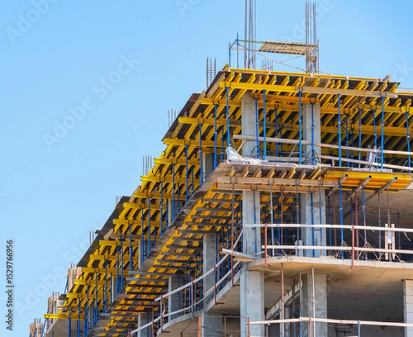 Fototapeta Construction of a multi-storey concrete monolithic building
