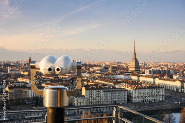 Obraz Public binoculars capture panoramic sunset view of Turin, Italy with Mole Antonelliana and Alpine backdrop. Elevated urban vista in the heart of Piedmont region