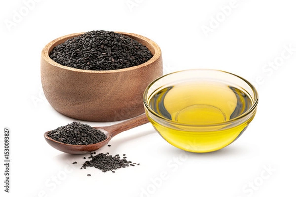 Obraz Sesame oil in a glass bowl with sesame in wooden bowl and spoon isolated on white background.