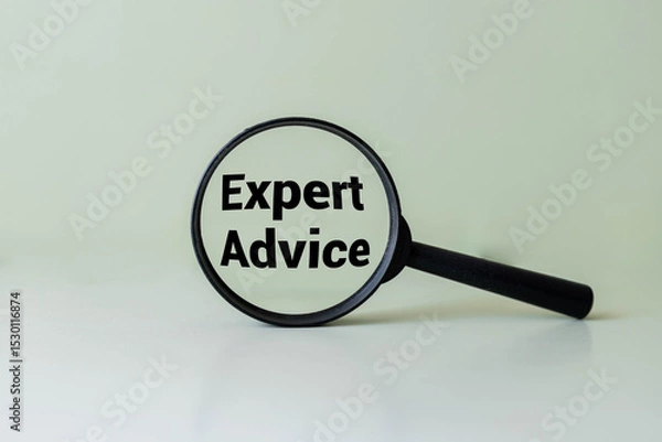 Fototapeta Expert advice symbol. Concept word Expert advice on magnifying glass.