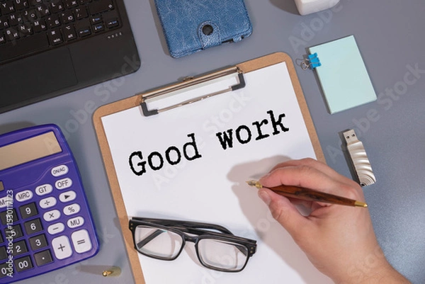 Fototapeta Good job text on adhesive note at office