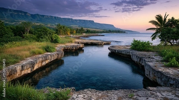 Fototapeta Tranquil coastal scenery at dawn.