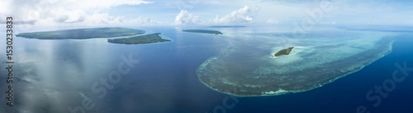 Obraz Healthy coral reefs surround the islands within Wakatobi National Park, off the coast of Sulawesi. This area is a popular destination for divers and snorkelers due to its high marine biodiversity.