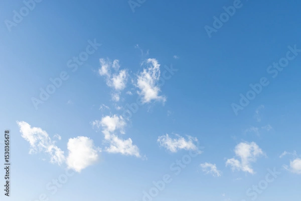 Obraz Fluffy white cloud on blue sky background, copy space