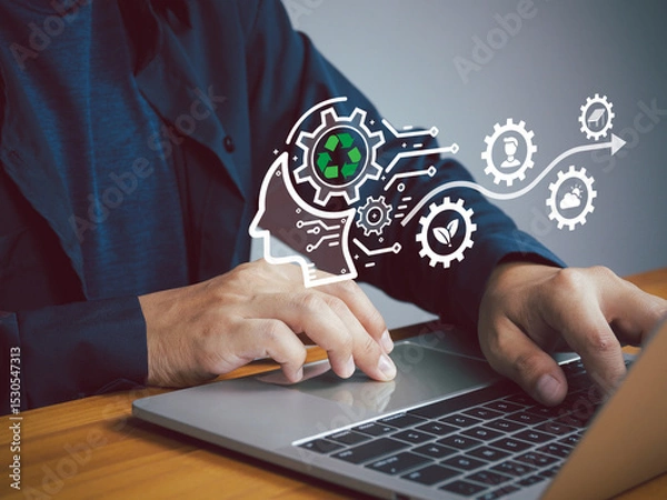 Fototapeta A person using laptop with digital icons representing recycling, sustainability, and innovation, symbolizing eco friendly technology and green business concepts